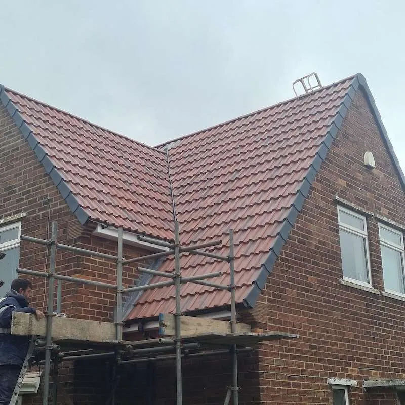 Newstone Roofers working on a residential roof